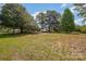 Expansive lot with mature trees, offering privacy and a serene setting for your dream home at 3595 Mt Holly Rd, Edgemoor, SC 29712