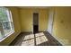 Bedroom with hardwood floors, a window, and two doors at 4227 Kiser Woods Sw Dr, Concord, NC 28025