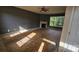 Spacious living room with fireplace and natural light streaming through the windows at 4227 Kiser Woods Sw Dr, Concord, NC 28025