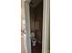 Small powder room with a toilet and a square mirror at 4227 Kiser Woods Sw Dr, Concord, NC 28025