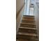 Carpeted stairs leading to the upper level of the home at 4227 Kiser Woods Sw Dr, Concord, NC 28025