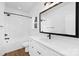 Beautiful bathroom with double vanity, soaking tub and black hardware at 428 Clay St, Mooresville, NC 28115
