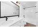 Beautiful bathroom featuring double vanity, tub/shower and black hardware at 428 Clay St, Mooresville, NC 28115