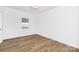 Simple, yet functional bedroom with natural light and wood-look flooring at 428 Clay St, Mooresville, NC 28115