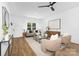 Cozy living room with hardwood floors, stylish furniture, and a large window for ample light at 428 Clay St, Mooresville, NC 28115