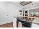 Open kitchen layout with granite countertops and a view to the adjacent living room at 433 W 8Th Street St, Charlotte, NC 28202