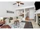 Inviting living room with vaulted ceilings, hardwood floors, and a stone fireplace at 433 W 8Th Street St, Charlotte, NC 28202
