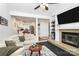 Bright living room featuring a fireplace, hardwood floors, and an open layout at 433 W 8Th Street St, Charlotte, NC 28202