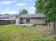 Spacious backyard featuring a well-maintained lawn and a cozy patio area, great for entertaining at 471 Hillandale Ne St, Concord, NC 28025