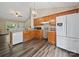 Kitchen featuring wood cabinets, granite countertops, and stainless steel appliances at 471 Hillandale Ne St, Concord, NC 28025