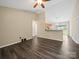 Open living room with wood-look floors, vaulted ceilings, and connected kitchen at 471 Hillandale Ne St, Concord, NC 28025