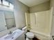 Well lit bathroom with a tub-shower combination, a vanity and updated fixtures at 5800 Silver Eagle Dr, Charlotte, NC 28214