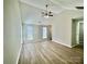 Bright, open room with wood-look floors, and natural light at 5800 Silver Eagle Dr, Charlotte, NC 28214
