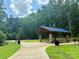 Community park featuring covered picnic shelter and lush green surroundings on a partly sunny day at 5800 Silver Eagle Dr, Charlotte, NC 28214
