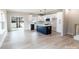 Modern kitchen with white cabinets, stainless steel appliances, and center island at 619 Billingsley Rd, Charlotte, NC 28211