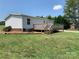 Lovely deck that offers a tranquil space, complemented by the lush greenery of the surrounding landscape at 6219 Heavner Rd, Vale, NC 28168