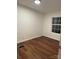 Bedroom featuring wood-style floors, a window for natural light, and ample space at 6219 Heavner Rd, Vale, NC 28168