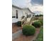 Charming exterior with wood deck, black railings and manicured landscaping for an inviting curb appeal at 6219 Heavner Rd, Vale, NC 28168