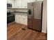 Kitchen features stainless steel appliances and white cabinets at 6219 Heavner Rd, Vale, NC 28168