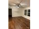 Living room with updated ceiling fan and natural light, complemented by stylish flooring for a cozy ambiance at 6219 Heavner Rd, Vale, NC 28168