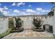 Backyard featuring tasteful landscaping, including stone and white gravel at 635 Brickdust Ct, Fort Mill, SC 29708