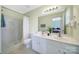 Bright bathroom with a double sink vanity, modern fixtures, and a shower at 635 Brickdust Ct, Fort Mill, SC 29708