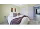Bedroom with ceiling fan, closet and neutral paint and decor at 635 Brickdust Ct, Fort Mill, SC 29708