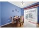 Bright dining area with hardwood floors and sliding door access to outdoor space at 635 Brickdust Ct, Fort Mill, SC 29708