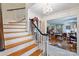 Traditional foyer featuring staircase, and view to the living room at 6434 Sardis Rd, Charlotte, NC 28270