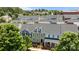 Neighborhood aerial view of townhomes featuring manicured landscaping and walkable sidewalks at 6438 Hove Rd, Mint Hill, NC 28227