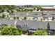 Neighborhood aerial view of townhomes with beautiful green landscaping and walkable sidewalks at 6438 Hove Rd, Mint Hill, NC 28227