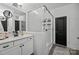 Modern bathroom with glass shower, stylish vanity, sleek fixtures, and a minimalist design for a spa-like experience at 6438 Hove Rd, Mint Hill, NC 28227