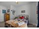 Comfortable bedroom with bed, ceiling fan, and dresser, offering a relaxing space for rest and rejuvenation at 6438 Hove Rd, Mint Hill, NC 28227
