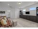 Spacious bonus room featuring neutral carpet, built-in storage, and plenty of natural light at 6438 Hove Rd, Mint Hill, NC 28227