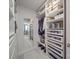 Organized walk-in closet with custom shelving and mirrored door, providing ample storage space at 647 R L Stowe Rd, Belmont, NC 28012