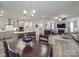 Open-concept home with kitchen, dining, and living area offers cohesive living space at 647 R L Stowe Rd, Belmont, NC 28012