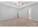 Open bedroom with neutral walls and carpet and white trim at 6632 Hawksnest Dr, Charlotte, NC 28269