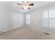 Bedroom with standard closet and bright, natural light at 6632 Hawksnest Dr, Charlotte, NC 28269