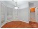 Cozy breakfast nook with lots of natural light and hardwood floors at 6632 Hawksnest Dr, Charlotte, NC 28269