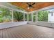 Enclosed screened porch with wood plank floors, tongue and groove ceiling, and outdoor views at 6632 Hawksnest Dr, Charlotte, NC 28269