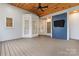 Enclosed screened porch with wood plank floors, tongue and groove ceiling, and a television at 6632 Hawksnest Dr, Charlotte, NC 28269