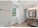 The bathroom has a window with view to the outside and an ornate sink at 7213 Lancer Dr, Charlotte, NC 28226