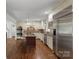 Well-equipped kitchen with a center island, stainless appliances, and abundant storage at 7213 Lancer Dr, Charlotte, NC 28226