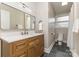 Well-lit bathroom with a single vanity, large mirror, and modern fixtures, providing a functional and clean space at 747 Saint Michaels Ln # 7, Gastonia, NC 28052