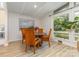 Dining room with natural light, wood flooring, and views of the backyard at 747 Saint Michaels Ln # 7, Gastonia, NC 28052