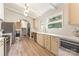 Spacious kitchen with stainless steel appliances, ample counter space, and wood-look flooring at 747 Saint Michaels Ln # 7, Gastonia, NC 28052