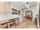 Well-lit kitchen with neutral cabinets, stainless steel appliances, and wood flooring at 747 Saint Michaels Ln # 7, Gastonia, NC 28052