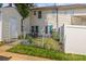 A cozy backyard with a patio area, partially fenced for privacy and gardening at 7881 Mariners Pointe Cir, Denver, NC 28037