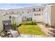 A relaxing backyard featuring a patio and green landscaping at 7881 Mariners Pointe Cir, Denver, NC 28037