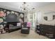 A cute Bedroom featuring a decorative floral wall, a crib, and a modern chandelier at 7881 Mariners Pointe Cir, Denver, NC 28037